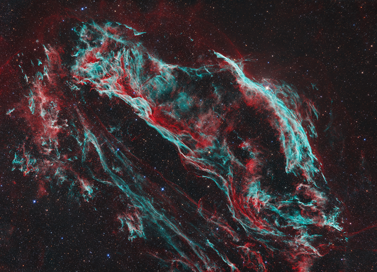 NGC 6960/6992- The Veil Nebula Complex by Tommy Lease. Taken with a ZWO ASI2600MM Pro cooled monochrome camera, a 6" f/4 Newtonian reflector telescope, and SkyWatcher USA EQ6-R Pro Mount.