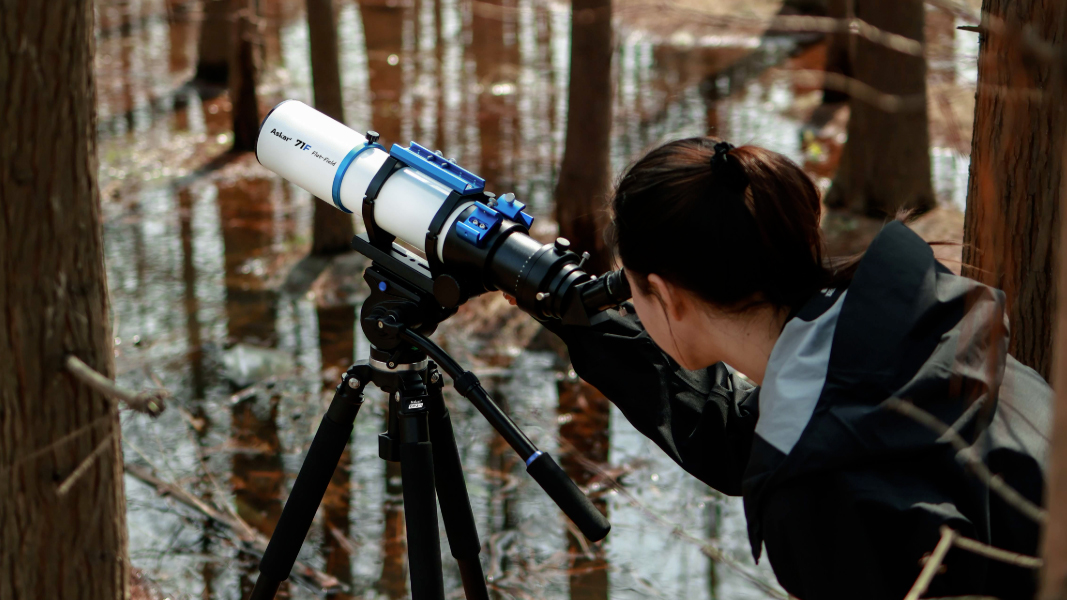 A lady looking through the Askar 71F doing daytime observations.