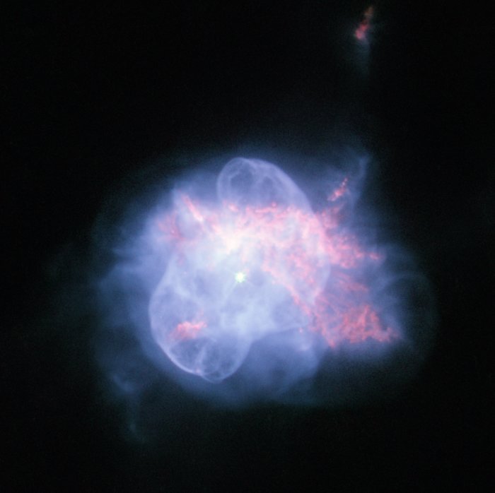 The Turtle Nebula, a colorful planetary nebula with layered, shell-like structures resembling a turtle’s shape, captured in vivid detail by NASA’s Hubble Space Telescope.