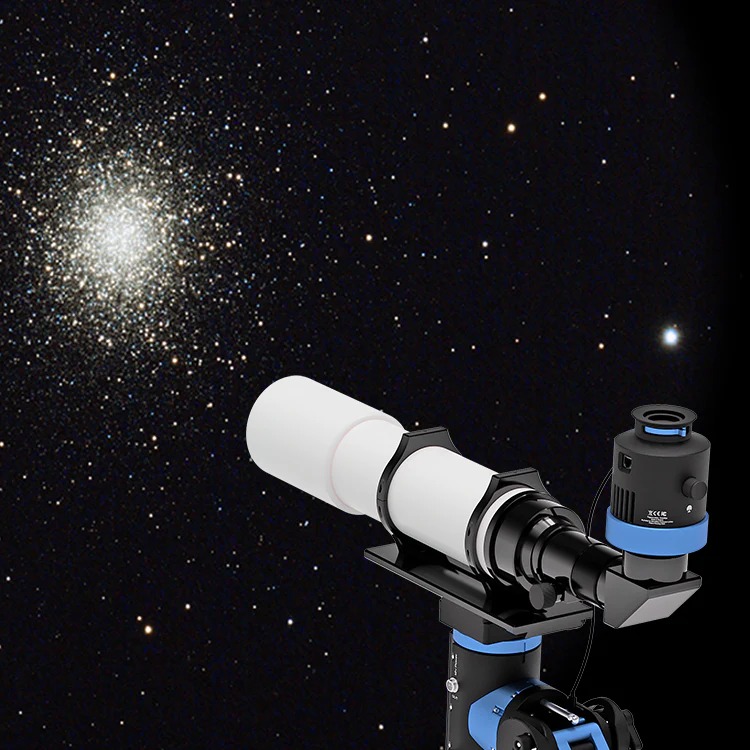 The SmartEye attached to a small white refractor telescope pointing towards a star cluster.