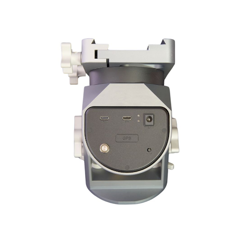 Front-on image of the WarpAstron WD-20 strain wave gear mount showing its various ports and connections. These include USB C for data transfer, a standard DC power port, and the cover to the GPS module. Also visible is the dual dovetail saddle plate.